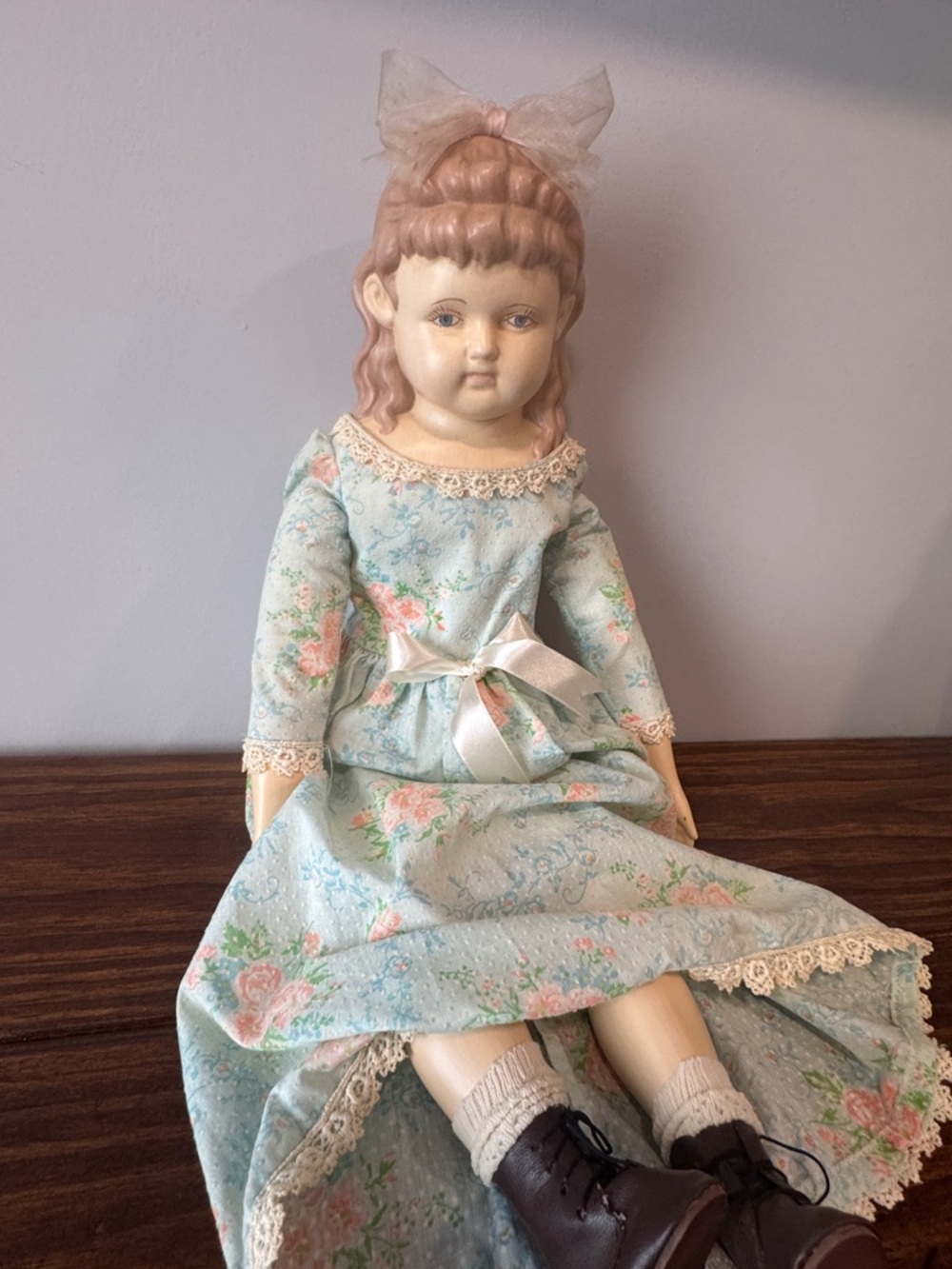 Vintage-Style Girl Doll in Light Blue Floral Dress